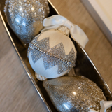 Ivory Ornament with Silver Beads and Bow